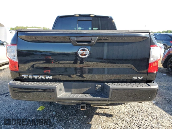 2021 Nissan Titan SV с VIN 1N6AA1EFXMN509569, выставлен на аукционе Copart как лот 52285595 с пробегом 70 296 миль миль и На запчасти • Non repairable. История ставок и продаж доступна на DreamBid. Изображение 6.