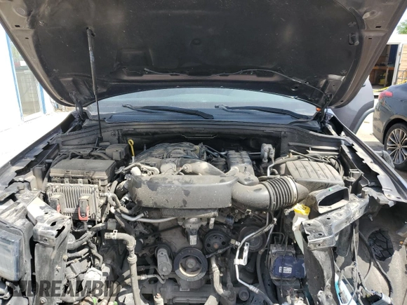 2017 Jeep Grand Cherokee Trailhawk with VIN 1C4RJFLGXHC654112, listed as a Copart auction lot 56397195 with 168,136 mi miles and Salvage title. Bid and sale history available at DreamBid. Image 12.