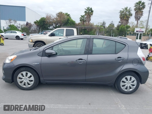 2014 Toyota Prius One with VIN JTDKDTB37E1564963, listed as a IAAI auction lot 42054591 with 186,680 mi miles and . Bid and sale history available at DreamBid. Image 14.