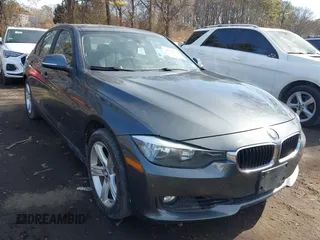 2013 BMW 3 Series 328i xDrive with VIN WBA3B3G58DNR79587, listed as a IAAI auction lot 41494987 with 115,336 mi miles. Bid and sale history available at carsss.com. Image 1.