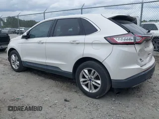 2015 Ford Edge SEL with VIN 2FMTK3J99FBC37403, listed as a IAAI auction lot 41970971 with 136,097 mi miles. Bid and sale history available at carsss.com. Image 3.