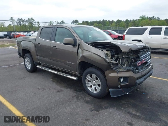 2015 GMC Canyon 2WD SLE with VIN 1GTG5BE38F1229799, listed as a IAAI auction lot 41944801 with 71,165 mi miles. Bid and sale history available at carsss.com. Image 1.