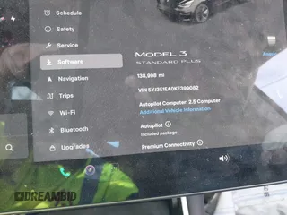 2019 Tesla Model 3 Mid Range with VIN 5YJ3E1EA0KF399082, listed as a IAAI auction lot 41697100 with 138,998 mi miles and . Bid and sale history available at carsss.com. Image 15.
