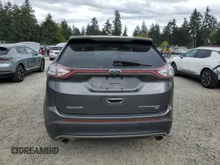 2015 Ford Edge Titanium z VIN 2FMTK4K84FBB09582, wystawiony jako Copart lot #55801915 z przebiegiem 72 533 mil mil oraz Szkoda całkowita • Salvage title. Historia ofert i sprzedaży dostępna na DreamBid. Obrazek 6.