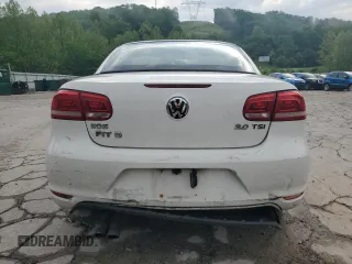 2012 Volkswagen Eos Komfort с VIN WVWBW7AH5CV000345, выставлен на аукционе Copart как лот 56725995 с пробегом 130 903 миль миль и Списание • Salvage title. История ставок и продаж доступна на DreamBid. Изображение 6.