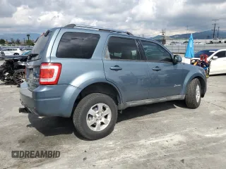 2010 Ford Escape Hybrid with VIN 1FMCU4K30AKC51022, listed as a Copart auction lot 51014615 with 128,275 mi miles and Salvage title. Bid and sale history available at DreamBid. Image 3.