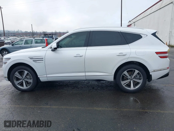 2021 Genesis GV80 with VIN KMUHCESC2MU052594, listed as a IAAI auction lot 41273763 with 19,190 mi miles and . Bid and sale history available at DreamBid. Image 14.