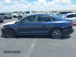 2014 Volkswagen Passat S with VIN 1VWAP7A30EC025369, listed as a IAAI auction lot 42525534 with 169,000 mi miles and . Bid and sale history available at DreamBid. Image 14.