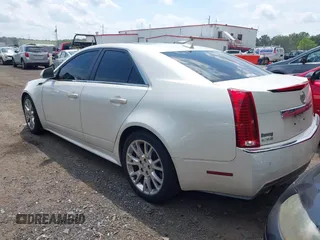 2011 Cadillac CTS Premium with VIN 1G6DP5ED2B0113072, listed as a IAAI auction lot 42797153 with 171,779 mi miles and . Bid and sale history available at DreamBid. Image 3.