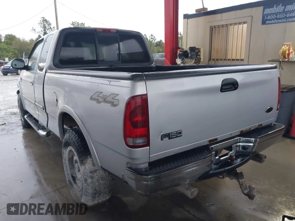 2003 Ford F-150 XL with VIN 1FTRX18W53NA09107, listed as a IAAI auction lot 41394520 with 187,489 mi miles. Bid and sale history available at carsss.com. Image 3.