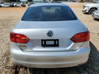 2014 Volkswagen Jetta S with VIN 3VW2K7AJ1EM289975, listed as a Copart auction lot 65003635 with 135,286 mi miles and Clean title. Bid and sale history available at DreamBid. Image 6.