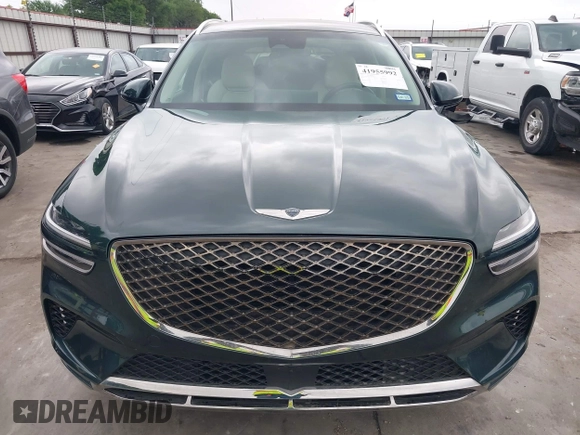 2022 Genesis GV70 2.5T with VIN KMUMADTB1NU065388, listed as a IAAI auction lot 41955992 with 23,134 mi miles and . Bid and sale history available at DreamBid. Image 13.