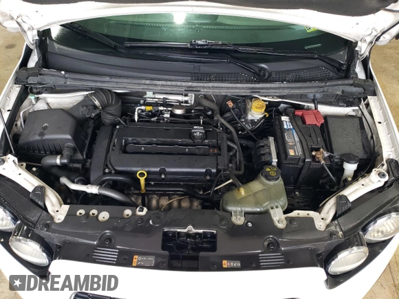 2015 Chevrolet Sonic LT with VIN 1G1JC5SGXF4126055, listed as a Copart auction lot 59579035 with 169,985 mi miles and Salvage title. Bid and sale history available at DreamBid. Image 11.