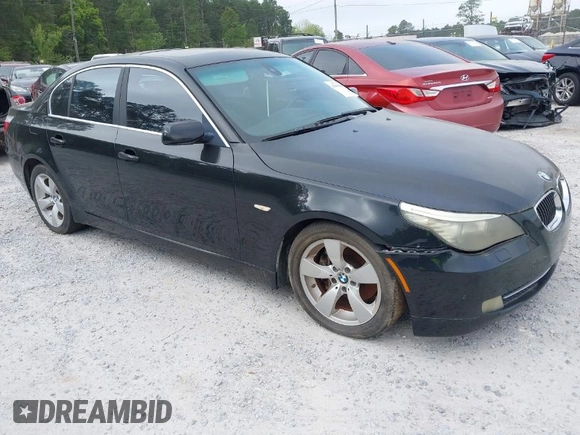2008 BMW 5 Series 528i with VIN WBANU53578CT00673, listed as a IAAI auction lot 41960389 with 142,409 mi miles and . Bid and sale history available at carsss.com. Image 1.