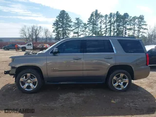 2017 Chevrolet Tahoe LT with VIN 1GNSCBKC2HR260627, listed as a IAAI auction lot 41580613 with 156,650 mi miles. Bid and sale history available at carsss.com. Image 15.