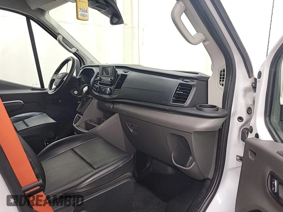 2023 Ford Transit Cargo with VIN 1FTBW3U84PKB20116, listed as a IAAI auction lot 42748031 with 6,591 mi miles and . Bid and sale history available at DreamBid. Image 9.