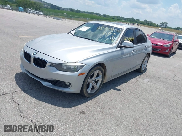 2013 BMW 3 Series 328i with VIN WBA3C1G5XDNR45054, listed as a IAAI auction lot 42504007 with 152,705 mi miles and . Bid and sale history available at DreamBid. Image 2.
