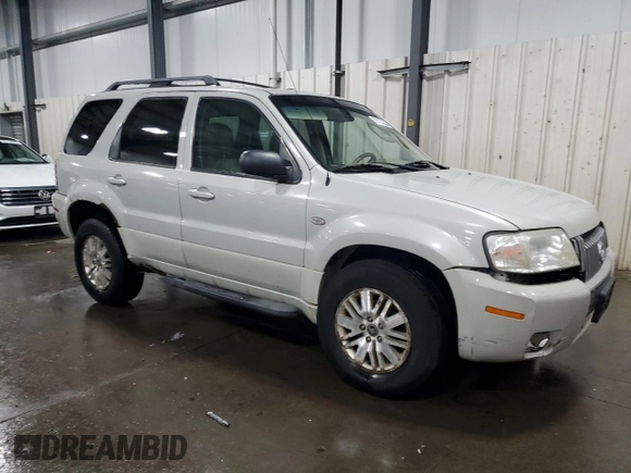 2007 Mercury Mariner Premier with VIN 4M2CU97127KJ20010, listed as a Copart auction lot 52123205 with 162,337 mi miles and Salvage title. Bid and sale history available at DreamBid. Image 4.