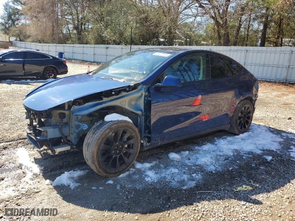 2022 Tesla Model Y Long Range with VIN 7SAYGDEEXNF386593, listed as a Copart auction lot 45477815 with 74,551 mi miles and Salvage Title. Bid and sale history available at carsss.com. Image 1.