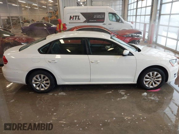 2012 Volkswagen Passat S with VIN 1VWAH7A35CC107902, listed as a IAAI auction lot 41243434 with 158,889 mi miles and . Bid and sale history available at DreamBid. Image 13.