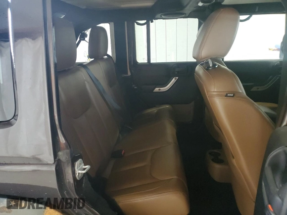 2013 Jeep Wrangler Unlimited Sahara with VIN 1C4HJWEG0DL658138, listed as a Copart auction lot 63792855 with Not provided miles and Clean title. Bid and sale history available at DreamBid. Image 11.