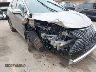 2021 Lexus RX with VIN 2T2HZMDA4MC305057, listed as a IAAI auction lot 41706486 with 37,518 mi miles. Bid and sale history available at carsss.com. Image 6.