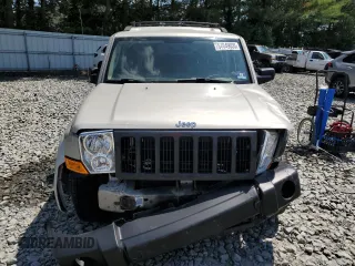 2007 Jeep Commander Sport z VIN 1J8HG48K67C651209, wystawiony jako Copart lot #64049035 z przebiegiem 216 628 mil mil oraz Szkoda całkowita • Salvage title. Historia ofert i sprzedaży dostępna na DreamBid. Obrazek 5.