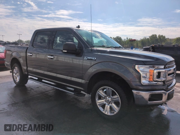 2019 Ford F-150 XL with VIN 1FTEW1E53KFB57102, listed as a Copart auction lot 61633055 with 86,949 mi miles and Salvage title. Bid and sale history available at DreamBid. Image 4.