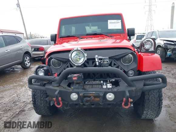 2015 Jeep Wrangler Unlimited Sahara with VIN 1C4BJWEG3FL590491, listed as a IAAI auction lot 41642219 with 148,759 mi miles. Bid and sale history available at carsss.com. Image 11.