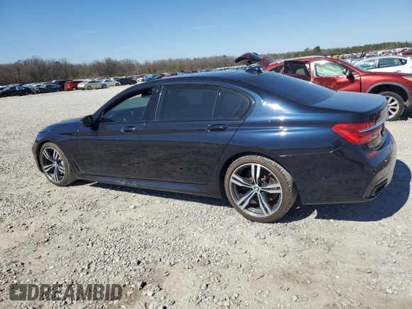 2016 BMW 7 Series 750i with VIN WBA7F0C57GGL99153, listed as a Copart auction lot 45475755 with 140,328 mi miles and Salvage title. Bid and sale history available at DreamBid. Image 2.