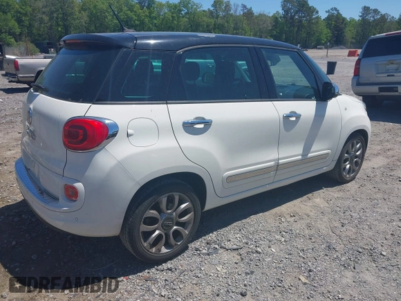 2014 FIAT 500L Lounge with VIN ZFBCFACH8EZ005469, listed as a IAAI auction lot 42002547 with 114,769 mi miles. Bid and sale history available at carsss.com. Image 4.