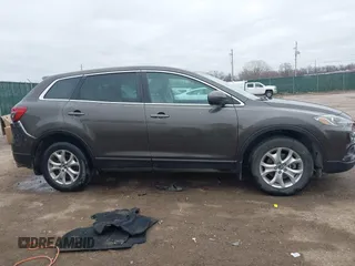 2015 Mazda CX-9 Touring with VIN JM3TB2CA5F0469348, listed as a IAAI auction lot 41516084 with 134,460 mi miles. Bid and sale history available at carsss.com. Image 14.
