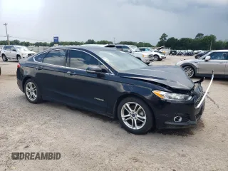 2016 Ford Fusion Titanium Hybrid with VIN 3FA6P0RUXGR204106, listed as a Copart auction lot 62769015 with 106,826 mi miles and Salvage title. Bid and sale history available at DreamBid. Image 4.