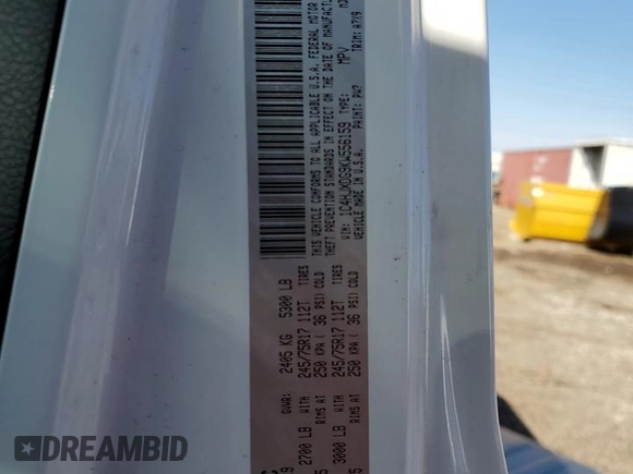 2019 Jeep Wrangler Unlimited Sport Altitude with VIN 1C4HJXDG9KW556159, listed as a Copart auction lot 49736915 with 77,374 mi miles and Salvage title. Bid and sale history available at DreamBid. Image 13.