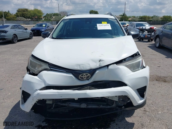 2017 Toyota RAV4 LE with VIN JTMZFREV2HJ711557, listed as a IAAI auction lot 41894094 with 167,645 mi miles. Bid and sale history available at carsss.com. Image 13.