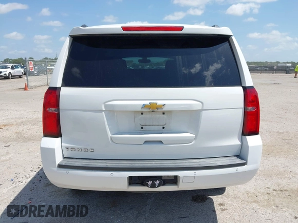 2015 Chevrolet Tahoe LS z VIN 1GNSCAKC6FR239156, wystawiony jako IAAI lot #42545513 z przebiegiem 117 863 mil mil oraz . Historia ofert i sprzedaży dostępna na DreamBid. Obrazek 16.
