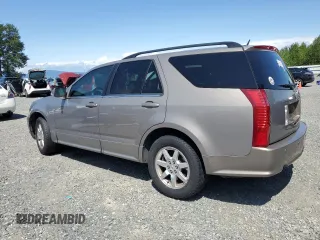 2008 Cadillac SRX RWD z VIN 1GYEE637780164161, wystawiony jako Copart lot #59238545 z przebiegiem 93 717 mil mil oraz Czysty tytuł • Clean title. Historia ofert i sprzedaży dostępna na DreamBid. Obrazek 2.