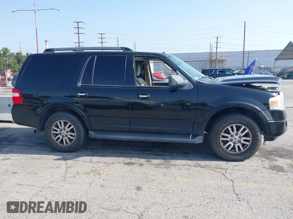 2012 Ford Expedition XLT with VIN 1FMJU1H59CEF00563, listed as a IAAI auction lot 42550959 with 120,855 mi miles and . Bid and sale history available at DreamBid. Image 13.