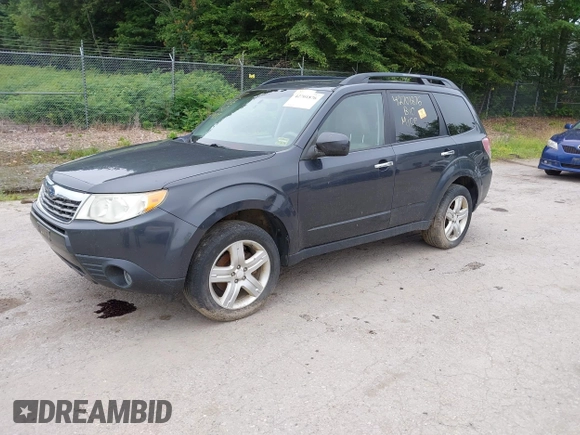 2009 Subaru Forester X with VIN JF2SH63679H701039, listed as a IAAI auction lot 42701876 with 127,401 mi miles and . Bid and sale history available at DreamBid. Image 2.