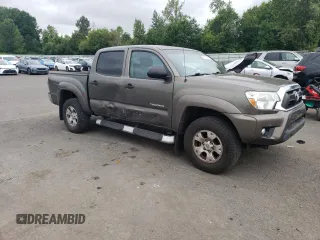 2013 Toyota Tacoma with VIN 3TMLU4EN5DM106850, listed as a Copart auction lot 61771865 with 153,507 mi miles and Salvage title. Bid and sale history available at DreamBid. Image 4.