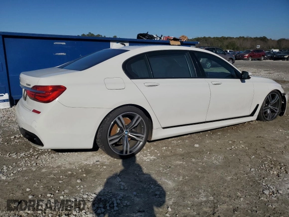 2016 BMW 7 Series 750i with VIN WBA7F0C56GGL99161, listed as a Copart auction lot 87652655 with 97,805 mi miles and Salvage Title. Bid and sale history available at carsss.com. Image 3.