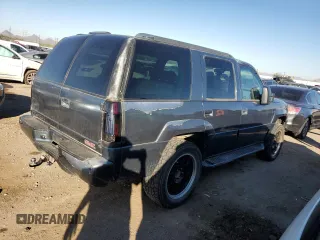 2000 GMC Denali z VIN 1GKEK13R5YR162198, wystawiony jako Copart lot #80325964 z przebiegiem 228 043 mil mil oraz Szkody całkowita. Historia ofert i sprzedaży dostępna na DreamBid. Obrazek 3.