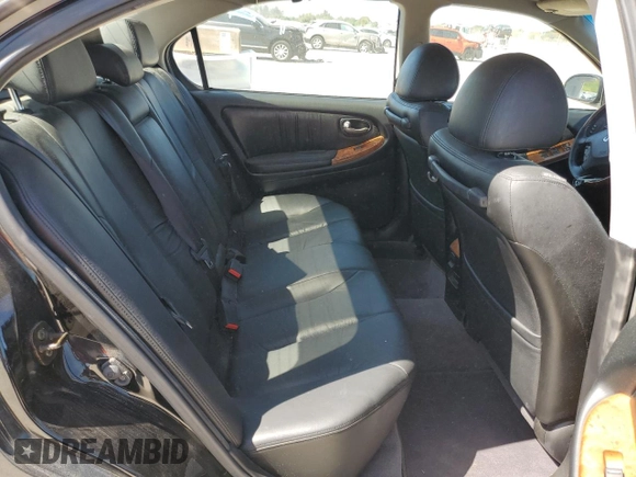 2003 Infiniti I35 Luxury z VIN JNKDA31A73T115221, wystawiony jako Copart lot #47275925 z przebiegiem 72 851 mil mil oraz Czysty tytuł • Clean title. Historia ofert i sprzedaży dostępna na DreamBid. Obrazek 10.