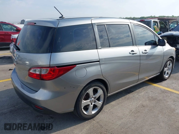 2014 Mazda 5 Sport z VIN JM1CW2BL9E0165101, wystawiony jako IAAI lot #42280068 z przebiegiem 147 336 mil mil oraz . Historia ofert i sprzedaży dostępna na DreamBid. Obrazek 4.