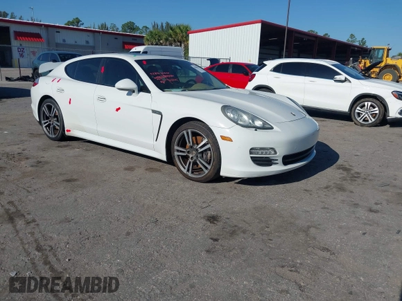 2013 Porsche Panamera with VIN WP0AA2A7XDL014047, listed as a IAAI auction lot 42010031 with 118,681 mi miles and . Bid and sale history available at DreamBid. Image 1.