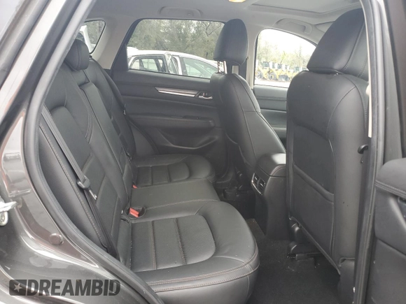2020 Mazda CX-5 Grand Touring with VIN JM3KFADM6L0839527, listed as a Copart auction lot 46677475 with 50,305 mi miles and Salvage Title. Bid and sale history available at DreamBid. Image 11.