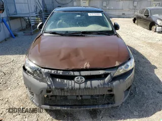 2012 Scion tC z VIN JTKJF5C70C3034928, wystawiony jako Copart lot #61272465 z przebiegiem 183 054 mil mil oraz Szkoda całkowita • Salvage title. Historia ofert i sprzedaży dostępna na DreamBid. Obrazek 5.