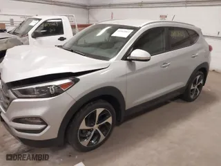 2016 Hyundai Tucson Eco with VIN KM8J3CA25GU138743, listed as a IAAI auction lot 41802063 with 70,989 mi miles. Bid and sale history available at carsss.com. Image 2.