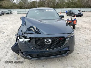 2022 Mazda CX-5 2.5 Turbo with VIN JM3KFBAY3N0603921, listed as a Copart auction lot 43679495 with 27,073 mi miles and Salvage Title. Bid and sale history available at carsss.com. Image 5.