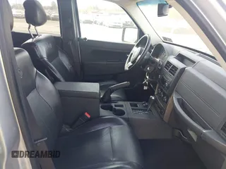 2012 Jeep Liberty Sport z VIN 1C4PJMAK7CW203620, wystawiony jako IAAI lot #42135469 z przebiegiem 163 127 mil mil oraz . Historia ofert i sprzedaży dostępna na DreamBid. Obrazek 5.